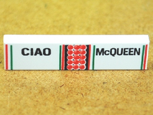 Part 2431pb0192 - Tile 1 x 4 with 'CIAO' and 'McQUEEN' Pattern - De BrickPlaats