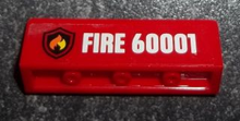 Part 30413pb032 - Panel 1 x 4 x 1 with Flame on Black Shield Fire Logo Badge, White 'FIRE 60001' Pattern (Sticker) - Set 60001 - De BrickPlaats