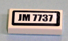 Part 3069pb0106 - Tile 1 x 2 with 'JM 7737' Pattern (Sticker) - Set 7737 - De BrickPlaats