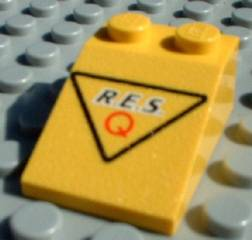 Part 3298pb024 - Slope 33 3 x 2 with Black 'R.E.S.' and Red 'Q' in Black Triangle Pattern - De BrickPlaats