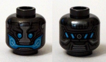 Part 3626pb1303 - Minifigure, Head Alien with Blue Eyes and Mouth and Silver Plates Pattern - De BrickPlaats